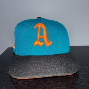 New Era Teal and Black Cap with Orange Logo